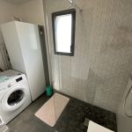 sittelles-lodge-terre-salle d'eau-lave linge